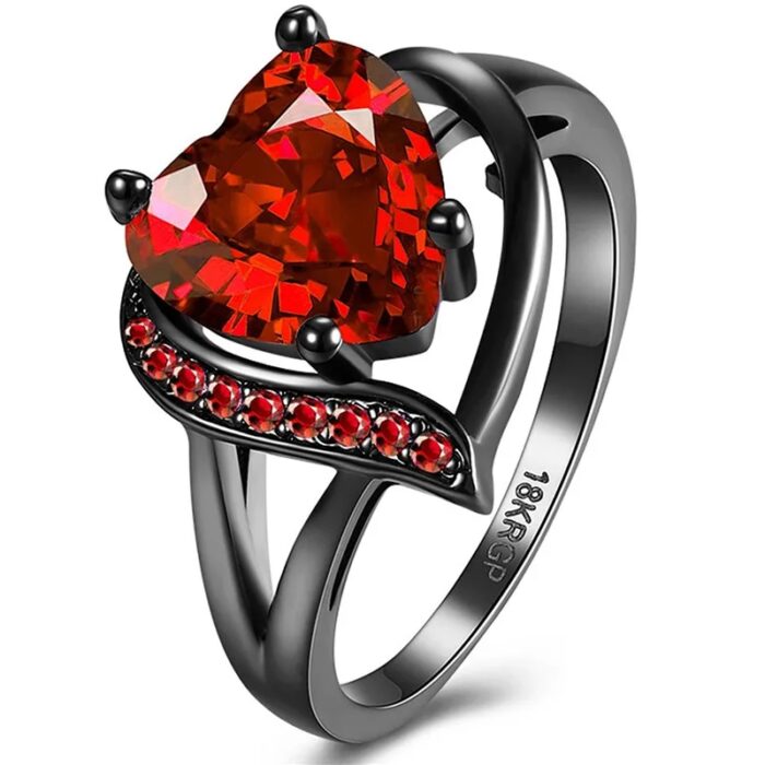 Black wedding ring with red stone